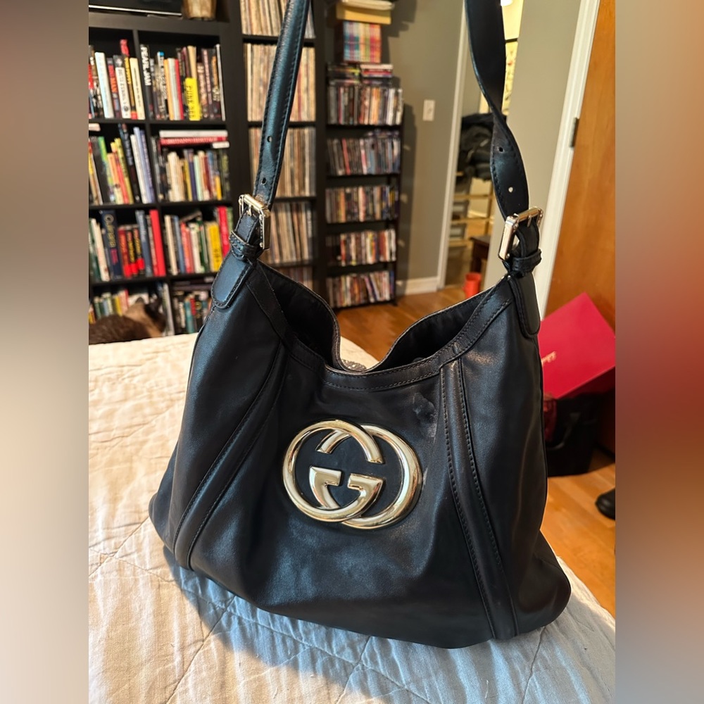 Black leather Gucci handbag.
